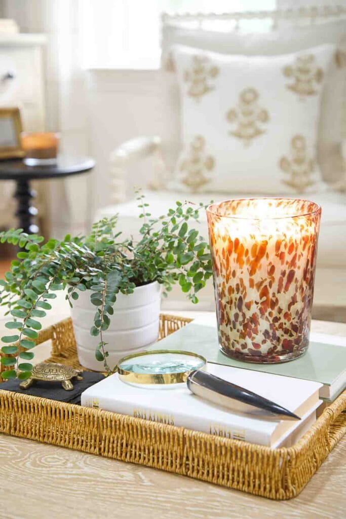 living room coffee table with a candle on it