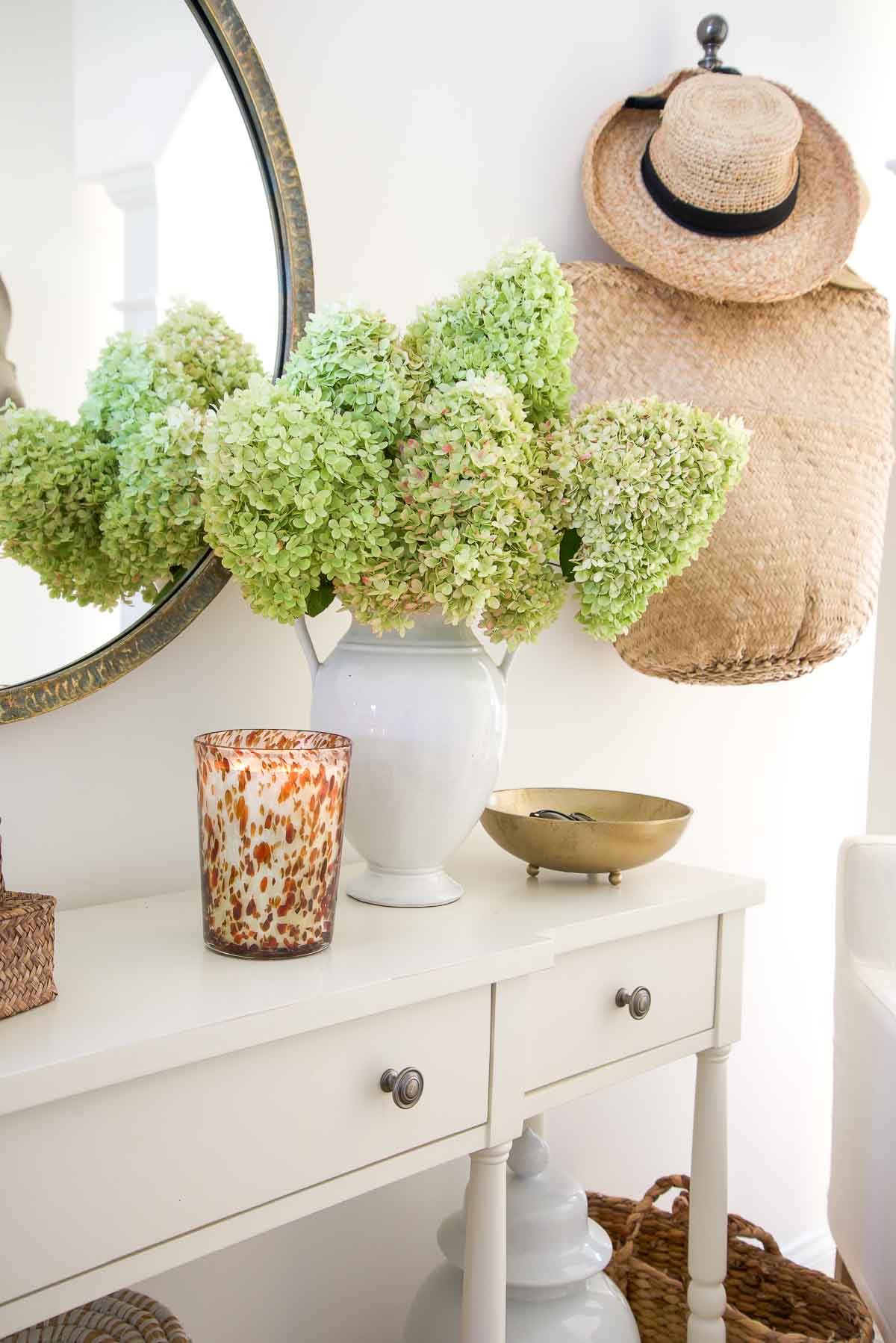 foyer with a vase of hydrangeas