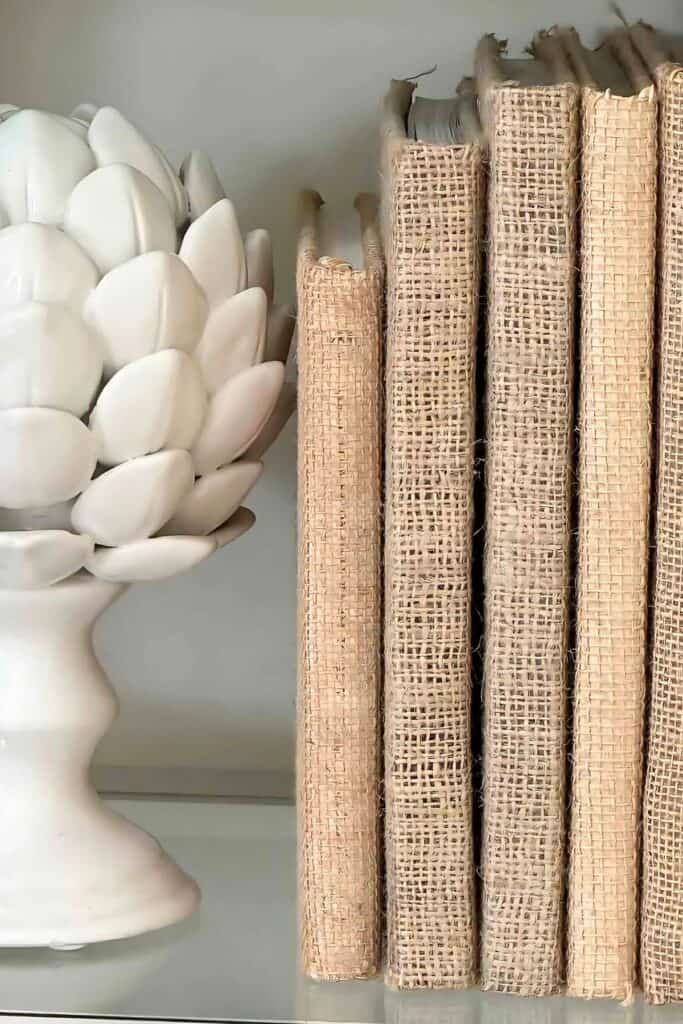 burlap books next to a bookend