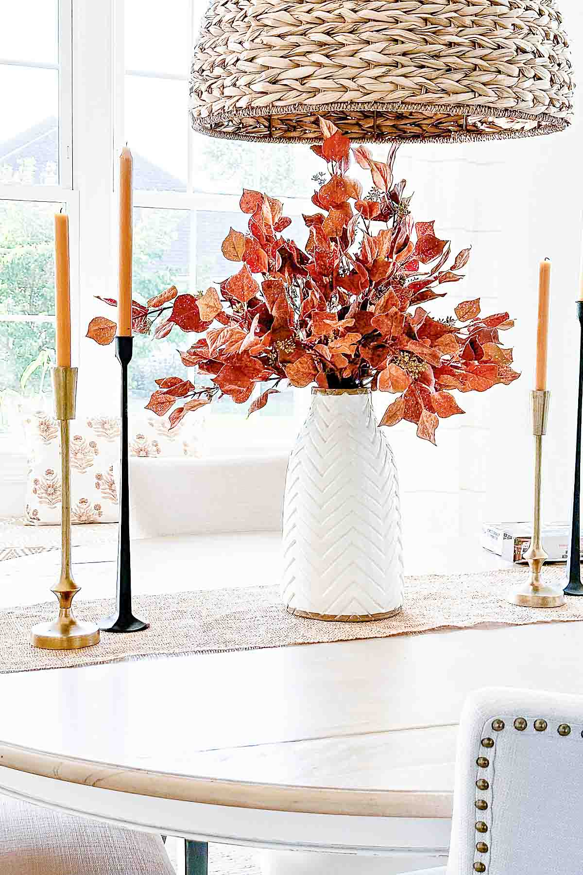 Fall Arrangement- tall vase filled with rust leaves