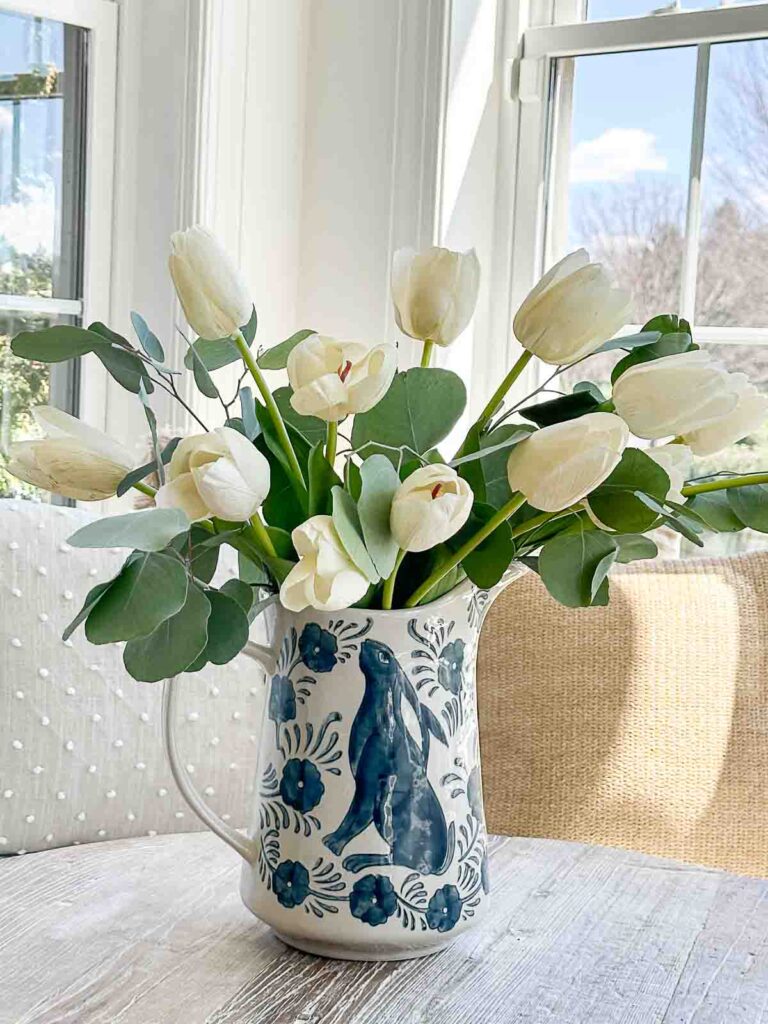 real and faux flowers together