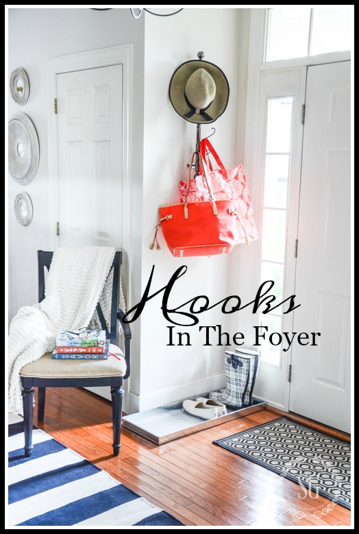 HOOKS IN THE FOYER-Create a space for guest to hang coats, purses and other thing on.