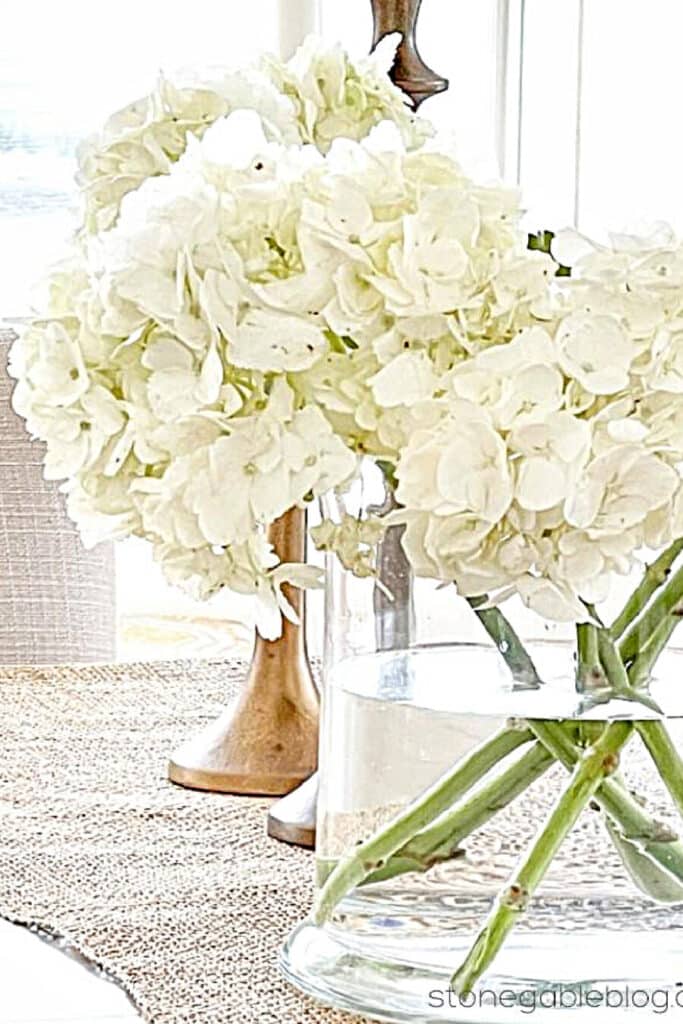 white hydrangeas in a glass container