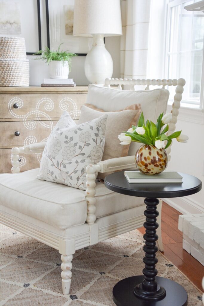 spring pillows on a white chair