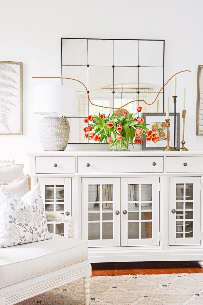 BUFFET WITH DECOR ON IT