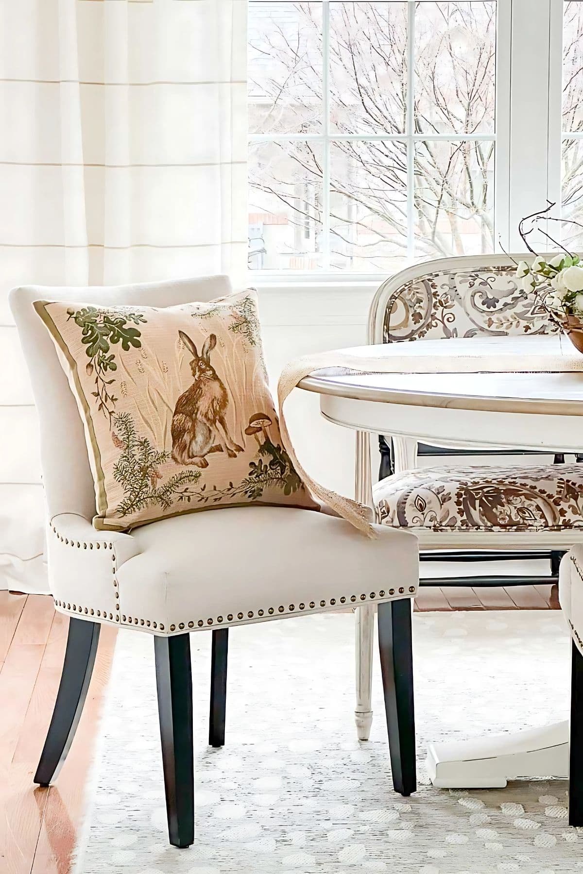 rabbit pillow on a dining room chair